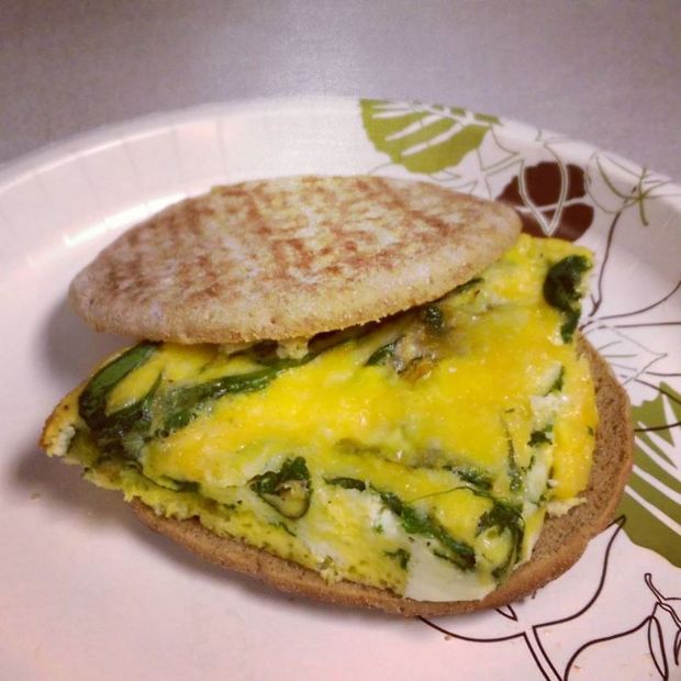 Baked scrambled eggs with cheese and spinach