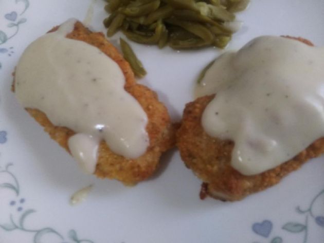 Cajun parmesan crusted Pork cutlets with white gravy