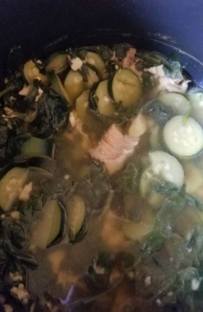 Fish  spinach and zucchini soup