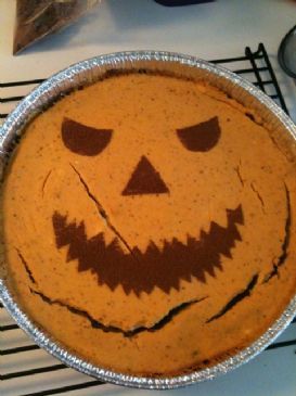 Chocolate-Orange-Pumpkin Jack-O-Lantern Layered Cheesecake