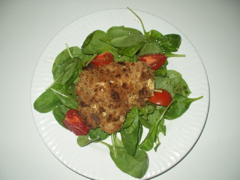 Feta-Stuffed Chicken on a bed of spinach