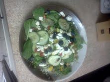 Spinach Salad with Blue berries, feta cheese and sweet sour dressing