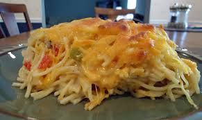 Jessicas Chicken Spaghetti  (This dish is a treat or potluck meal. Not diet friendly)