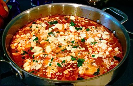 Shakshuka - (poached eggs in spicy tomato sauce)