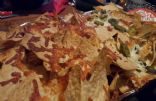 Nachos with cheese, salsa and beans