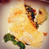 Eggs with Mock Hollandaise Sauce over Sweet Potato and Kale Hash