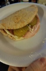 Ham and cheese with basil aioli on pita bread