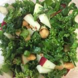 Kale Apple Salad with trail mix, cashews and Maple Dressing