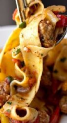 Kathy's Saucy Italian Drunken Noodles with Spicy Italian Sausage