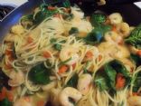 Left over pasta becomes Shrimp Scampi w/roasted peppers & spinach