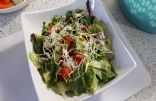 Mixed lettuce, tom, pepper, cuke, rad, and sprouts salad