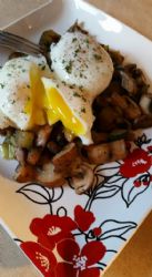 Poached eggs with sauteed leeks, mushrooms, and zucchini