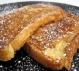 French Toast with Syrup and Powdered Sugar