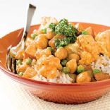 INDIAN-STYLE CURRY WITH POTATOES, CAULIFLOWER, PEAS, AND CHICKPEAS