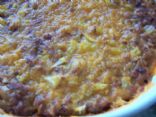 Beef and Bean Dip with Cheddar Cheese/Onion Topping