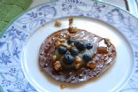 Pancakes topped with Applesauce, Blueberries and Walnuts