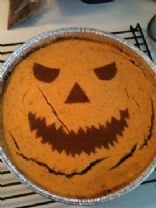 Chocolate-Orange-Pumpkin Jack-O-Lantern Layered Cheesecake