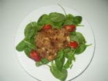Feta-Stuffed Chicken on a bed of spinach