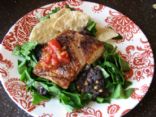 Salmon over black beans and spinach