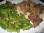 Beef tips with mushrooms, green bean almandine and brown rice