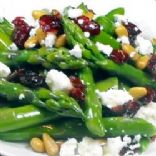 Asparagus with pine nuts, cranberries and feta
