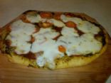 Pizza with Pesto, Mozzarella, Pepperoni, Tomatoes