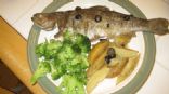 Whole trout with potatoes and olives