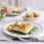 Cheddar Crusted Smoked Haddock with  Jersey Royals & Creme Fraiche Sauce