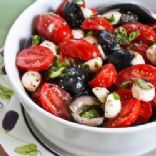 Tomato, Olive, and Mozzarella Salad with Basil Vinaigrette