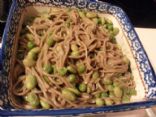 Soba noodles with peas and edamame in peanut sauce