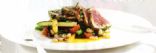 Herb-crusted poached tuna w bean & zucchini salad