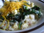 Grits with eggs and spinach