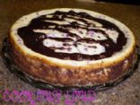 Chocolate Truffle Cran-Orange Cheesecake (by www.cookoutloud.com)