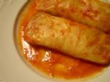 stuffed cabbage leaves in tomato sauce by Tetiana Anokhina