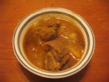 Slow cooked goat meat curry