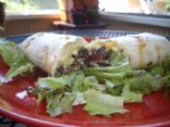 Left Overs Burritos over a bed of lettuces.